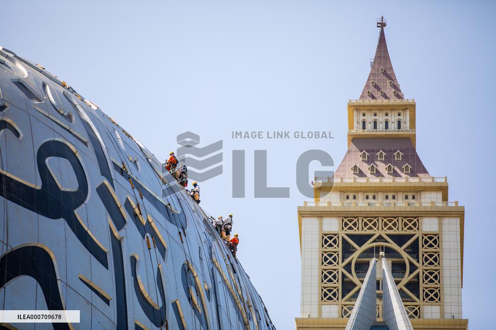 Workers clean the Museum of the Future - Dubai