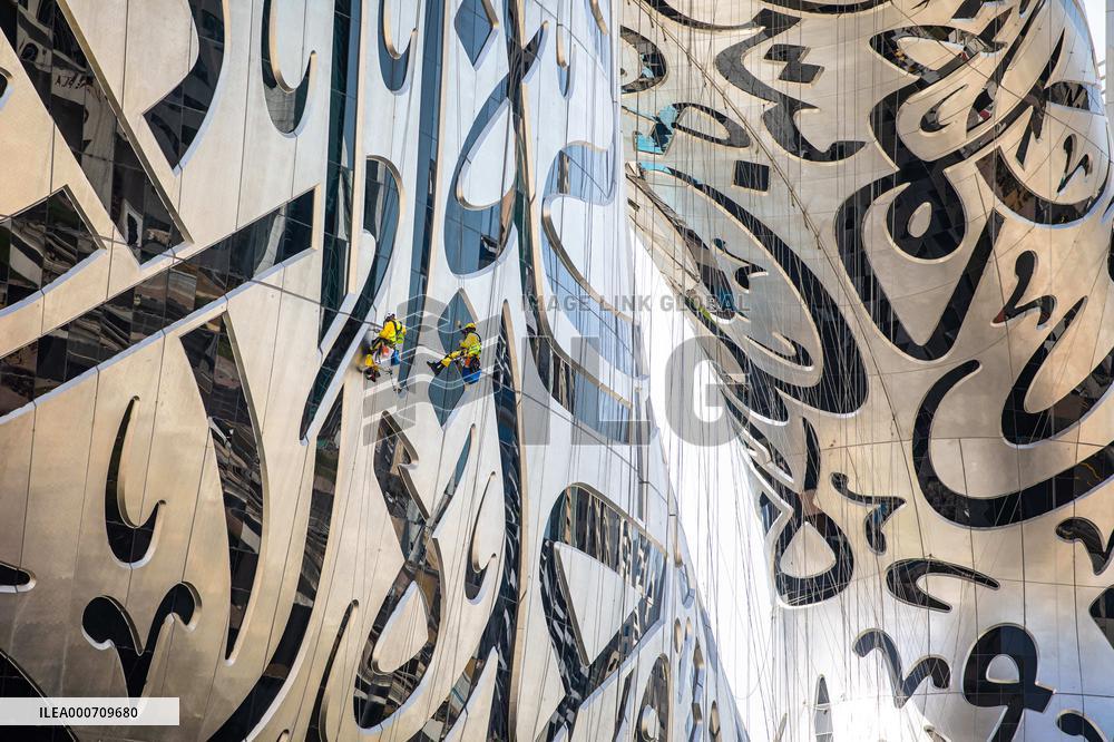Workers clean the Museum of the Future - Dubai