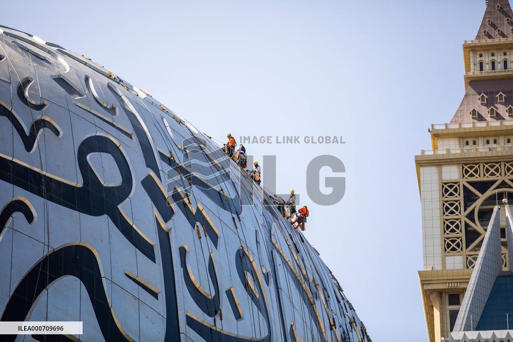 Workers clean the Museum of the Future - Dubai