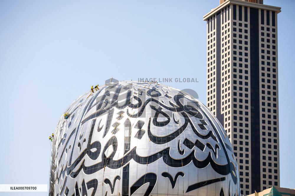 Workers clean the Museum of the Future - Dubai