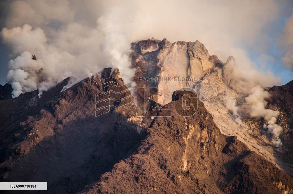 Daily-life Under The Shadows of Sinabung Eruption - Indonesia