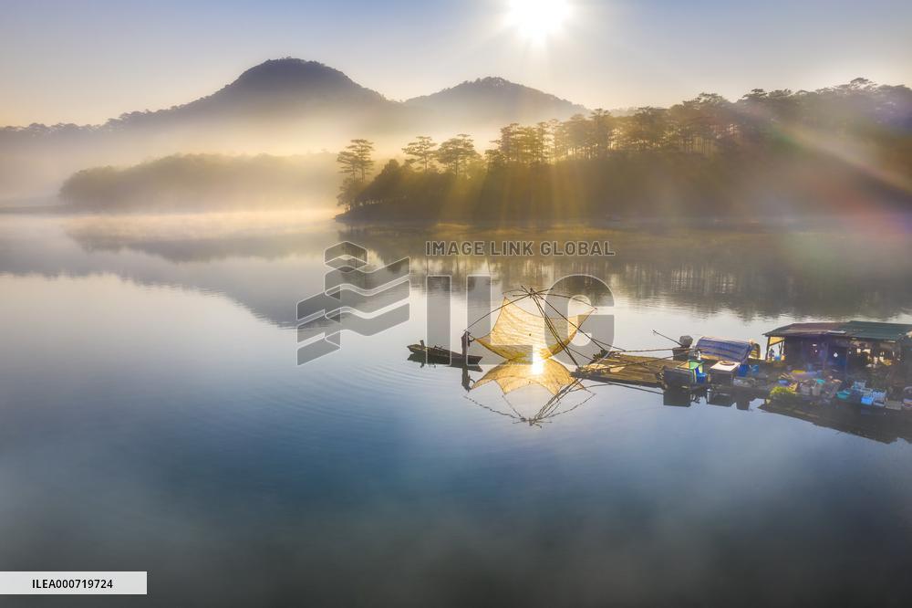 A Man Fishing In Tuyen Lam Lake - Vietnam