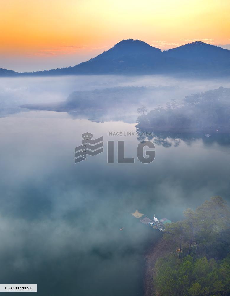 A Man Fishing In Tuyen Lam Lake - Vietnam