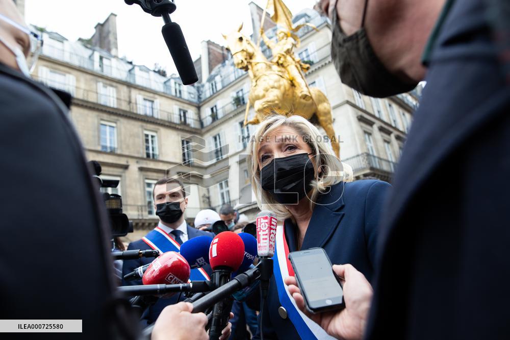Marine Le Pen Lays Flowers To A Statue Of Joan of Arc - Paris