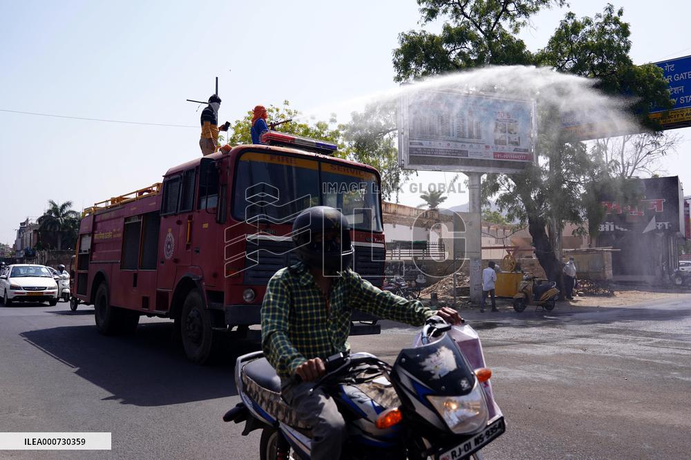 Workers Spray Disinfectant On The Road In Ajmer - India