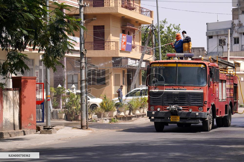 Workers Spray Disinfectant On The Road In Ajmer - India