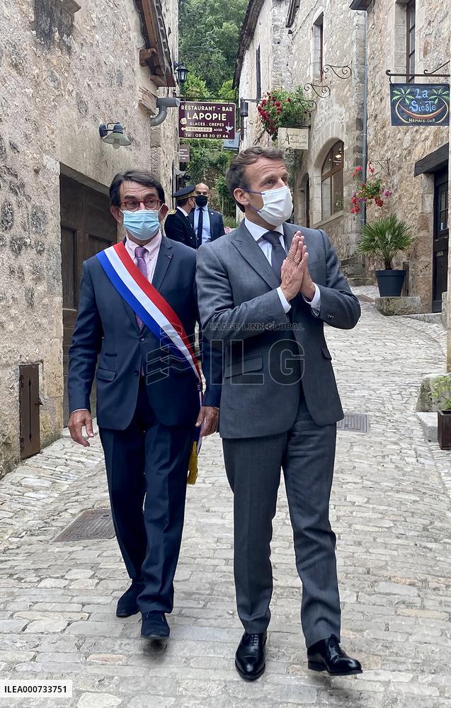 President Macron During A Visit In Saint-Cirq-Lapopie