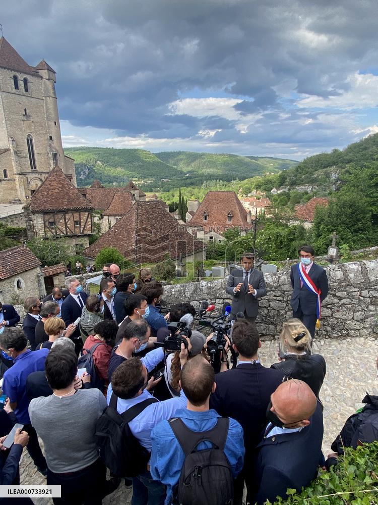President Macron During A Visit In Saint-Cirq-Lapopie