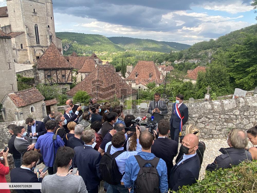 President Macron During A Visit In Saint-Cirq-Lapopie