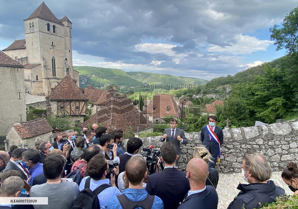 President Macron During A Visit In Saint-Cirq-Lapopie
