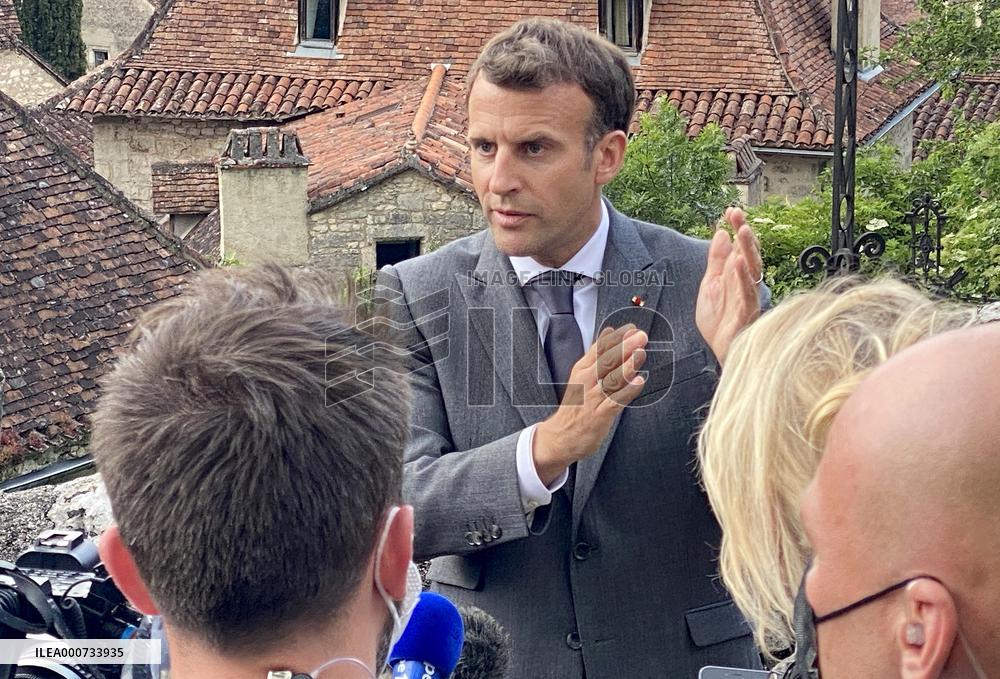 President Macron During A Visit In Saint-Cirq-Lapopie