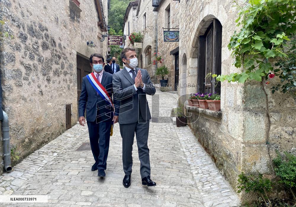 President Macron During A Visit In Saint-Cirq-Lapopie