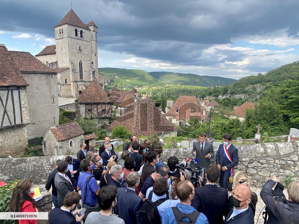 President Macron During A Visit In Saint-Cirq-Lapopie