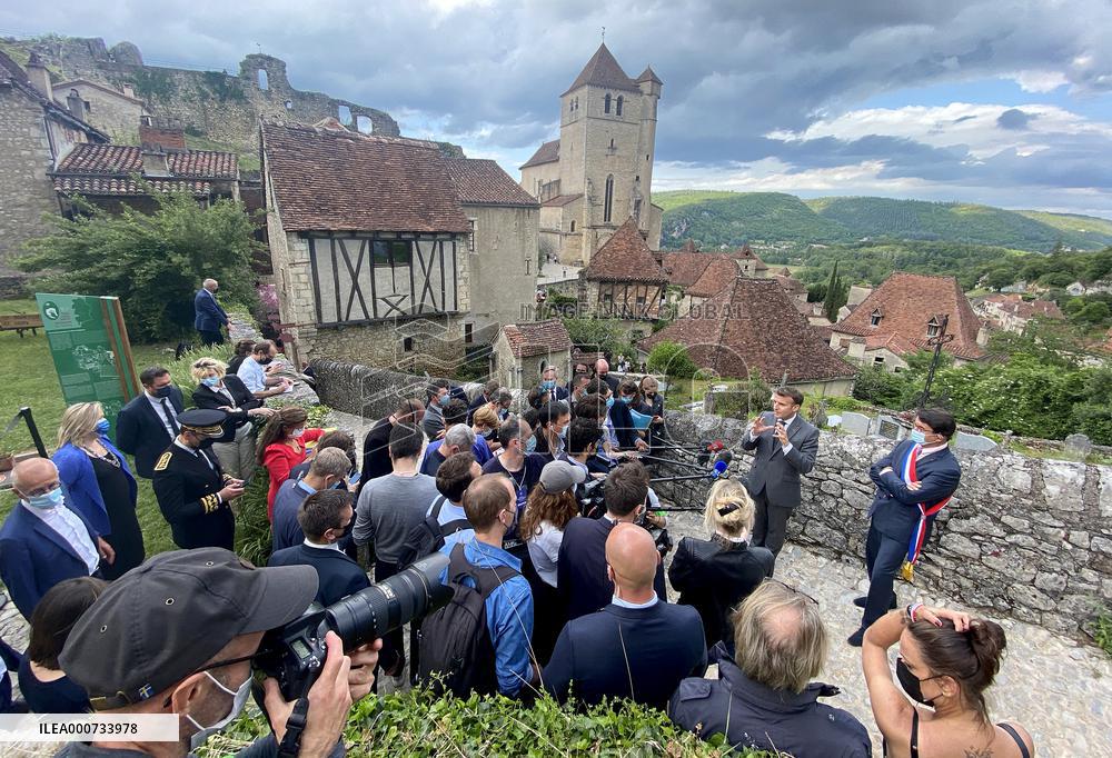 President Macron During A Visit In Saint-Cirq-Lapopie