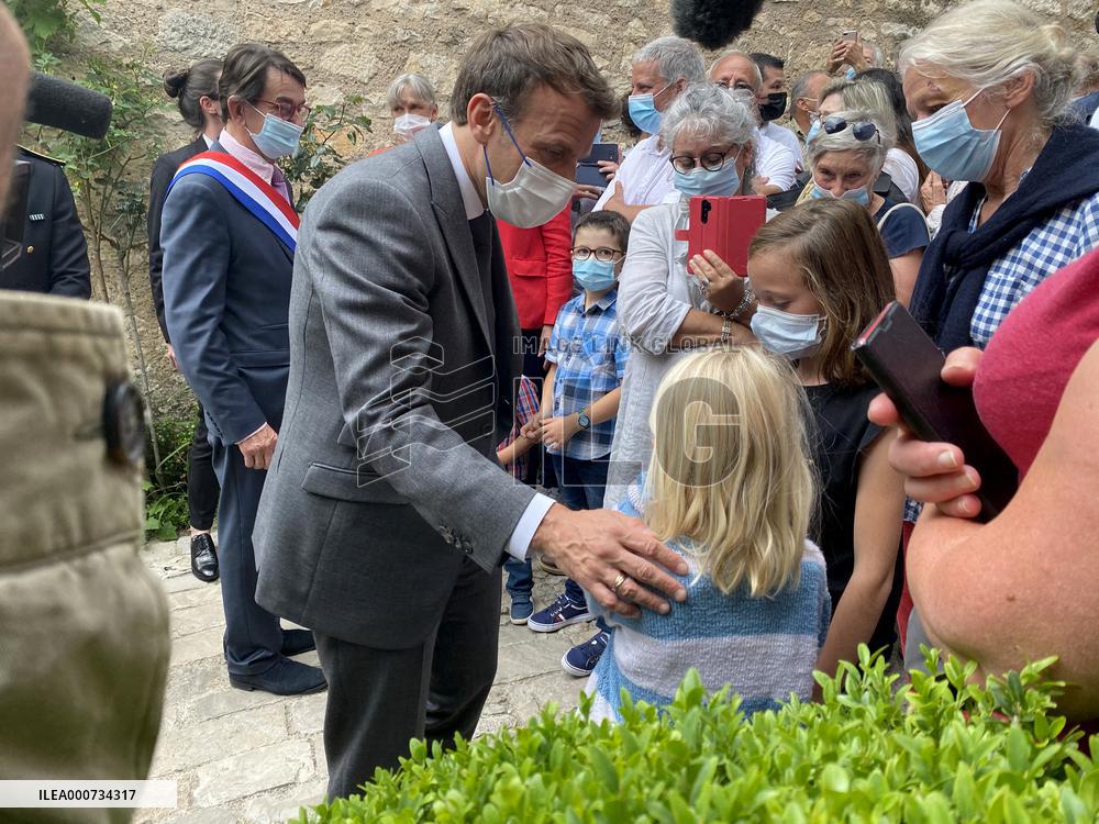 President Macron During A Visit In Saint-Cirq-Lapopie