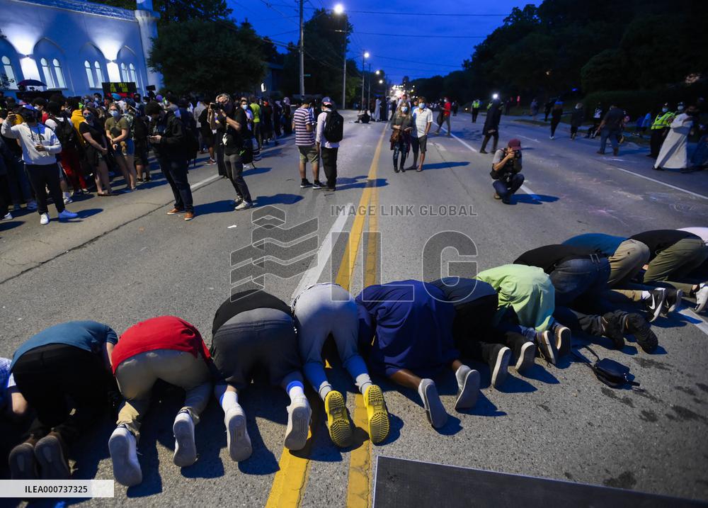 Tribute At The Scene Of Sunday's Hate-Motivated Vehicle Attack - Ontario