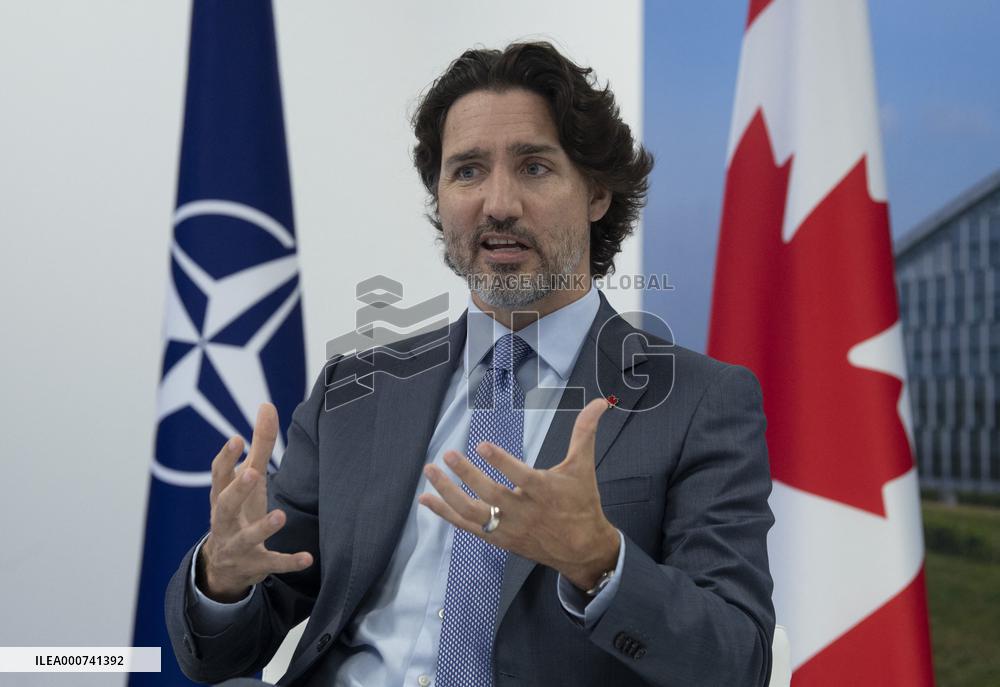NATO Summit - Justin Trudeau and Jens Stoltenberg