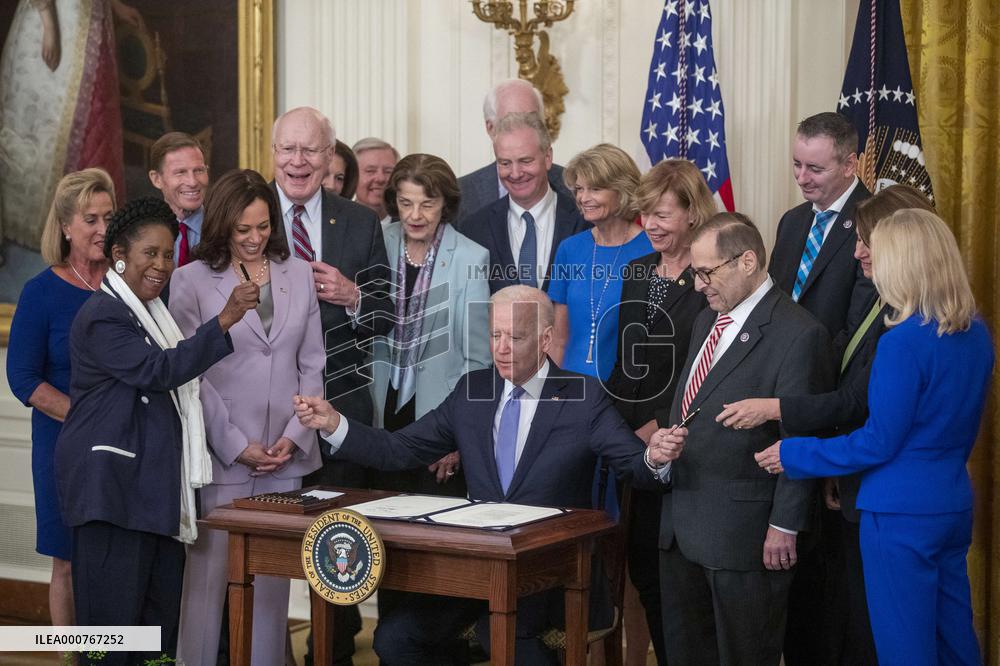 US President Joe Biden participates in a bill signing ceremony for the Crime Victims Fund Act of 2021