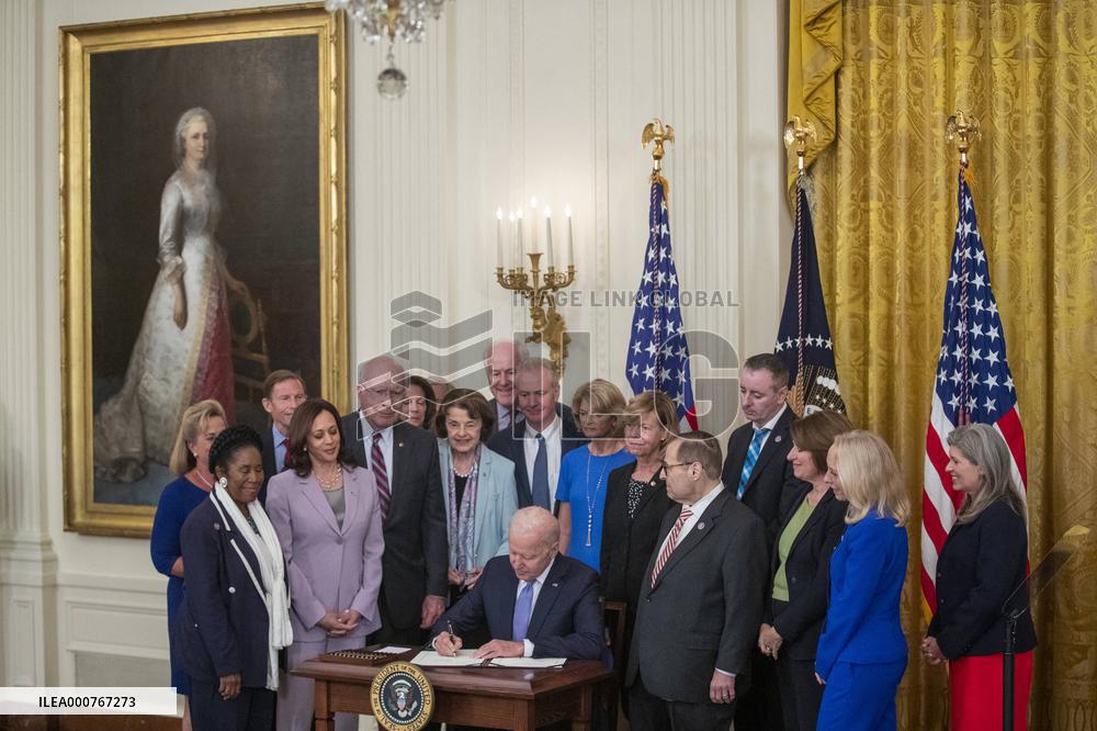 US President Joe Biden participates in a bill signing ceremony for the Crime Victims Fund Act of 2021