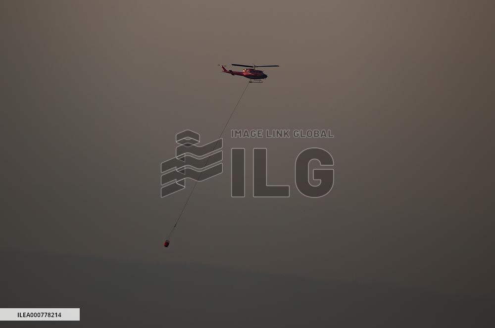 Smoke From Wildfires Burning In The Area Hangs In The Air - B.C