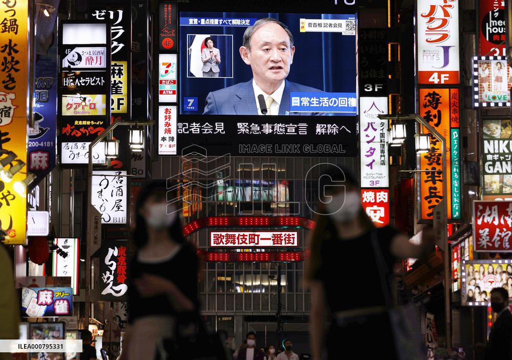 Japan decides to end COVID-19 emergency as cases fall