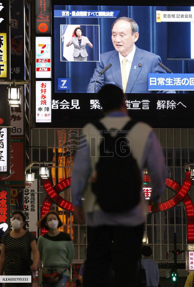 Japan decides to end COVID-19 emergency as cases fall