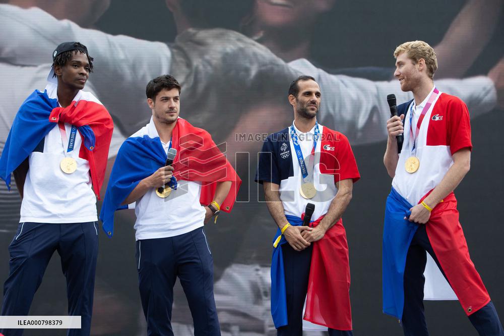 France gold medalists foil fencing team at the fan zone of the Trocadero - Paris