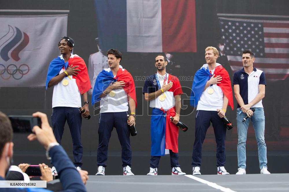 France gold medalists foil fencing team at the fan zone of the Trocadero - Paris