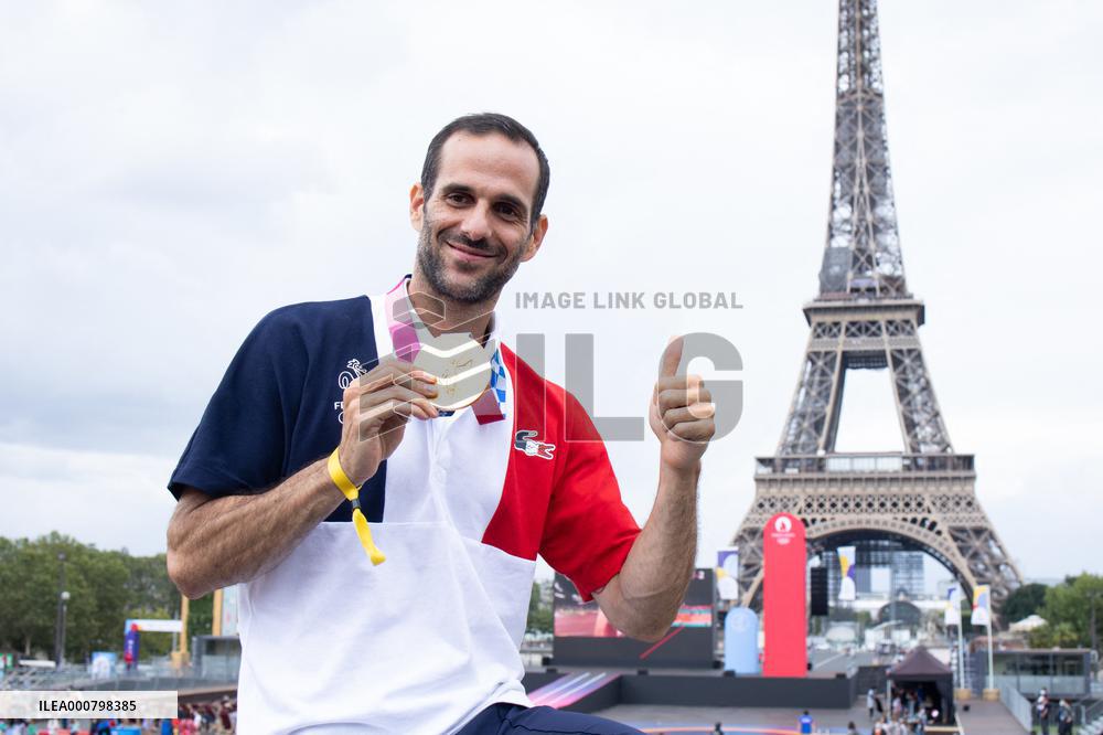 France gold medalists foil fencing team at the fan zone of the Trocadero - Paris