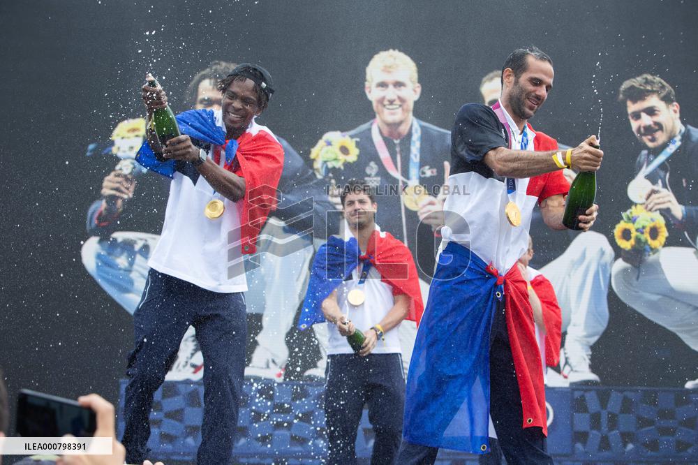 France gold medalists foil fencing team at the fan zone of the Trocadero - Paris