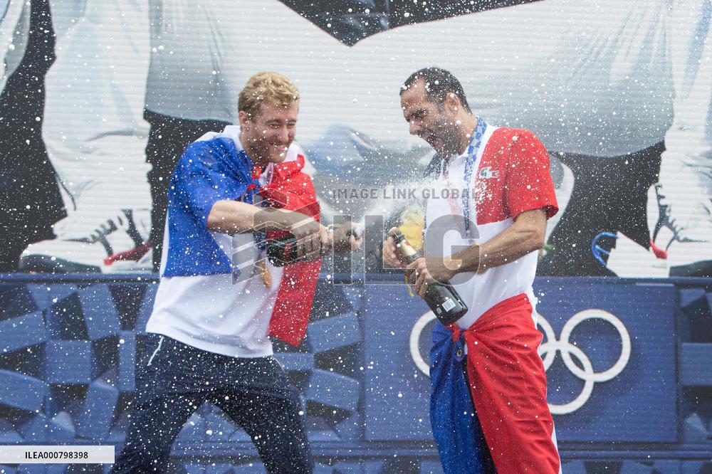France gold medalists foil fencing team at the fan zone of the Trocadero - Paris