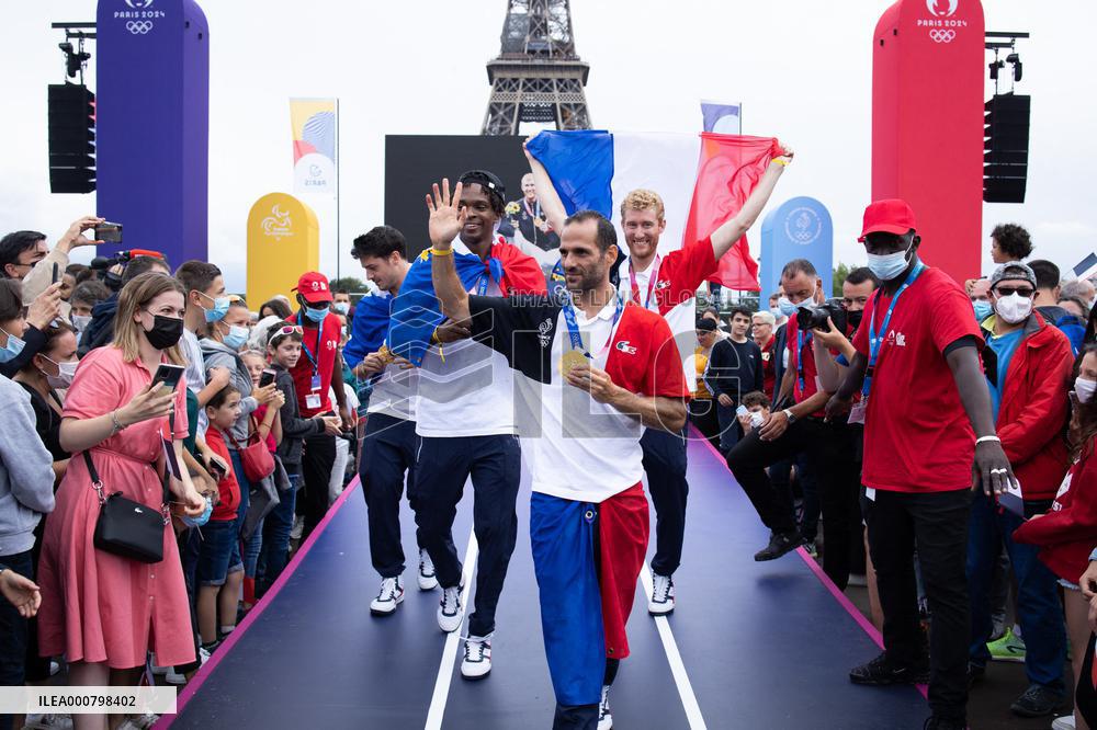 France gold medalists foil fencing team at the fan zone of the Trocadero - Paris