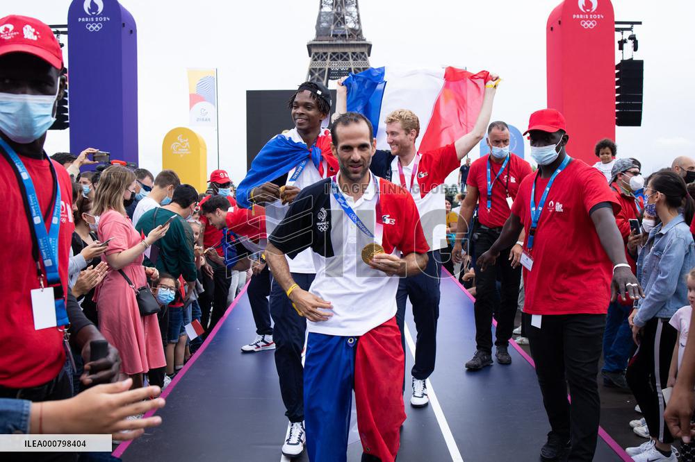 France gold medalists foil fencing team at the fan zone of the Trocadero - Paris
