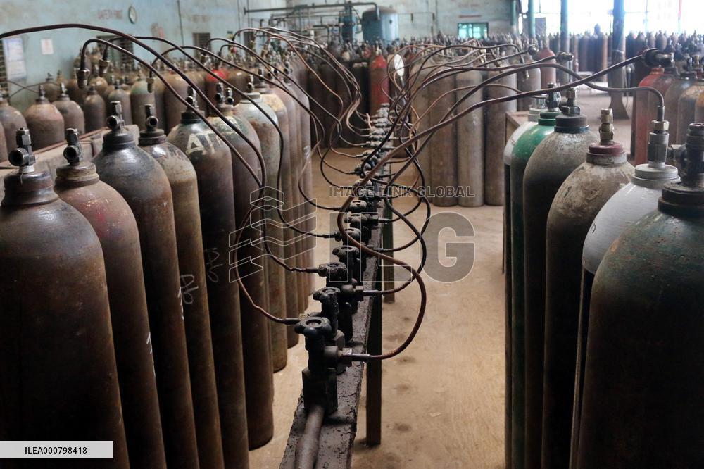 Workers supply oxygen tanks as new Delta variant of Covid-19