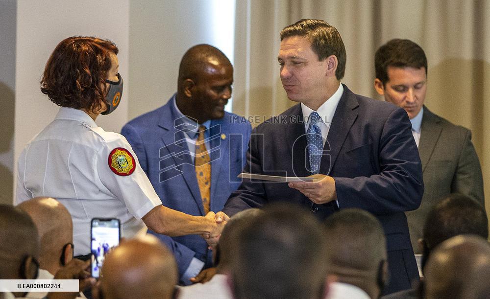 DeSantis Hands Out Bonus Checks To First Responders - Florida