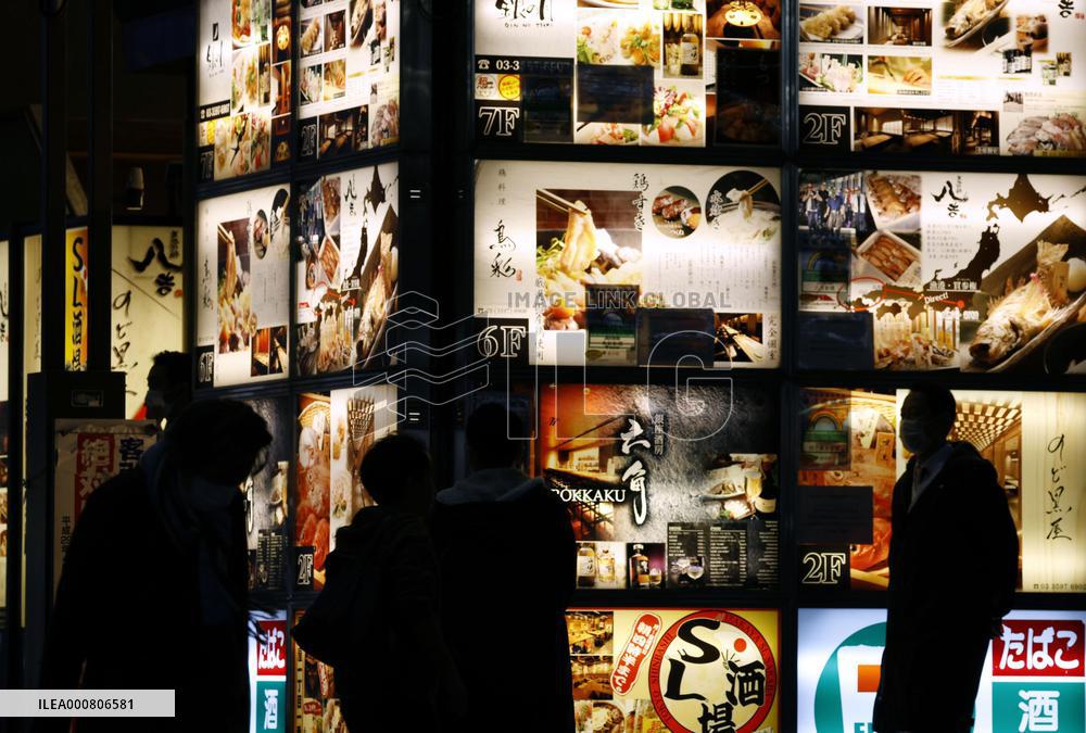 CORRECTED: Tokyo to lift COVID curbs on eateries as infections drop