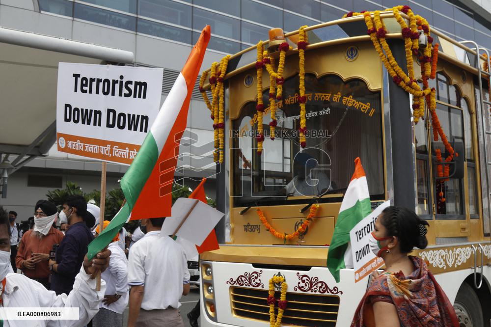 Sikh's Members Carry 3 Saroops Of Sri Guru Granth Sahibat At Airport - Delhi