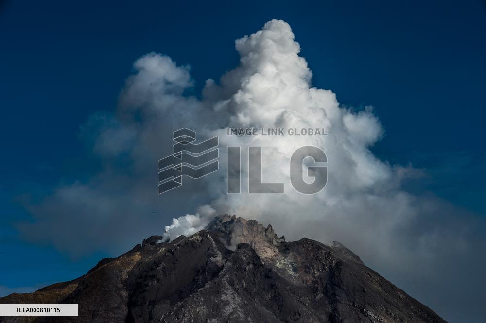 Sinabung Volcano Spews A Massive Column Of Smoke - Sumatra