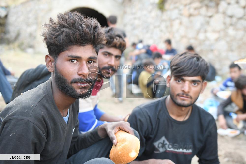 Afghan refugees crossing illegally entering Turkey