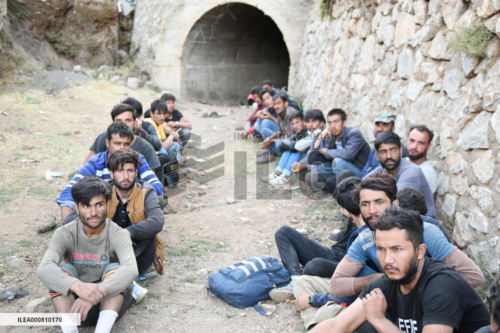 Afghan refugees crossing illegally entering Turkey