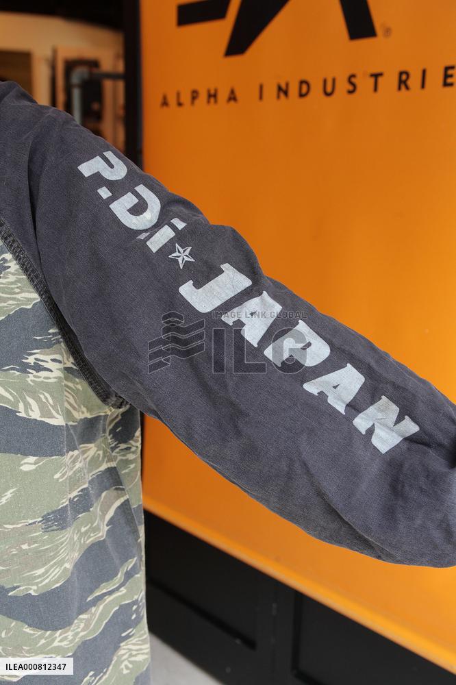 Girls playing an air soft gun (a survival game)