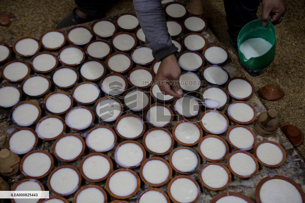 Preparing traditional yogurt in Bhaktapur, Nepal