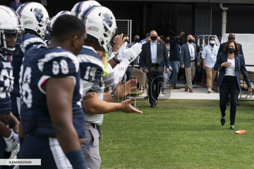 Kamala Harris flips a coin ahead of Howard University vs Hampton University football game