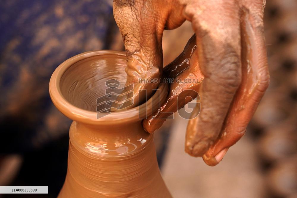 Indian Potter Makes Earthen Lamps for Diwali festival in Ajmer - Rajasthan