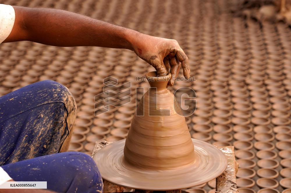 Indian Potter Makes Earthen Lamps for Diwali festival in Ajmer - Rajasthan