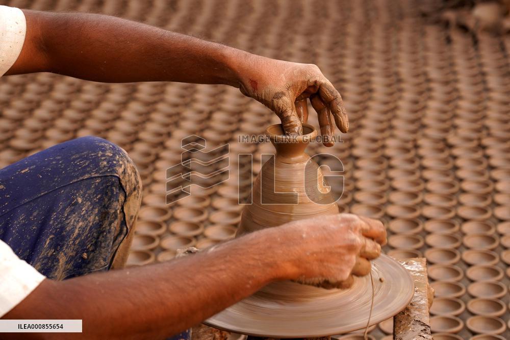 Indian Potter Makes Earthen Lamps for Diwali festival in Ajmer - Rajasthan