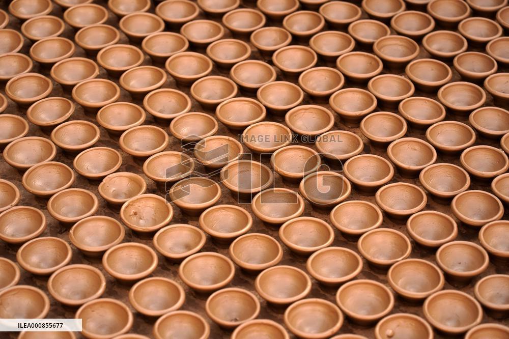 Indian Potter Makes Earthen Lamps for Diwali festival in Ajmer - Rajasthan