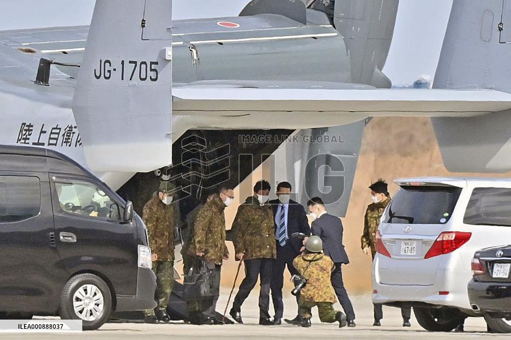 Japan's defense minister boards Osprey