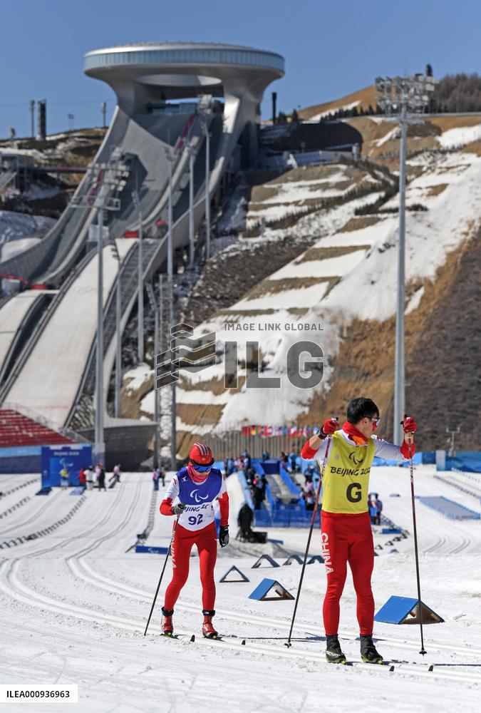(SP)CHINA-ZHANGJIAKOU-WINTER PARALYMPICS-PARA CROSS-COUNTRY SKIING -WOMEN'S LONG DISTANCE CLASSIC VISION IMPAIRED(CN)
