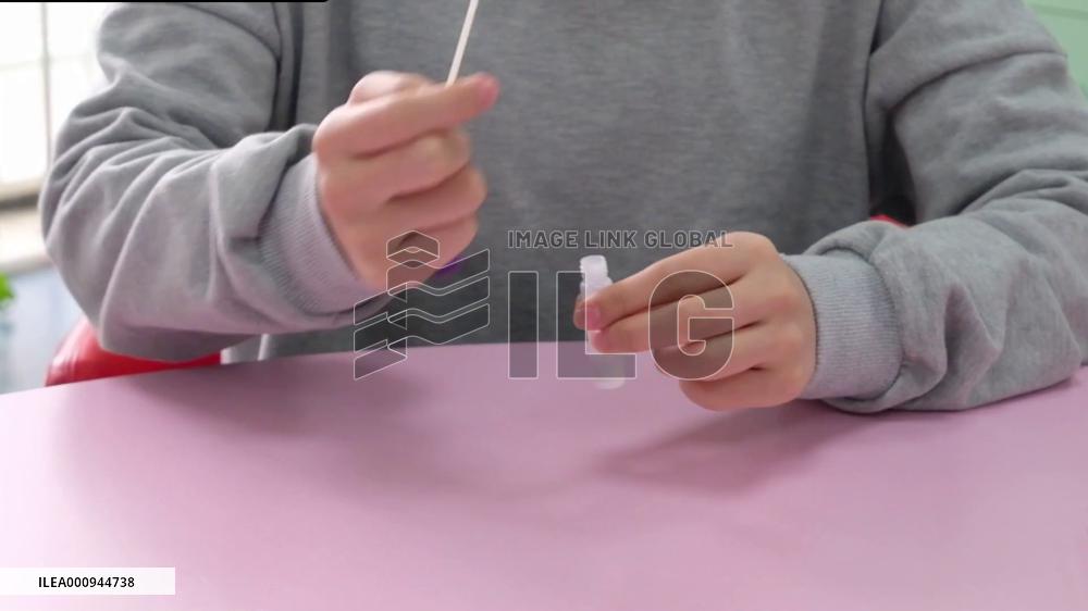 Chinese biopharma company steps up COVID-19 antigen self-testing kits production